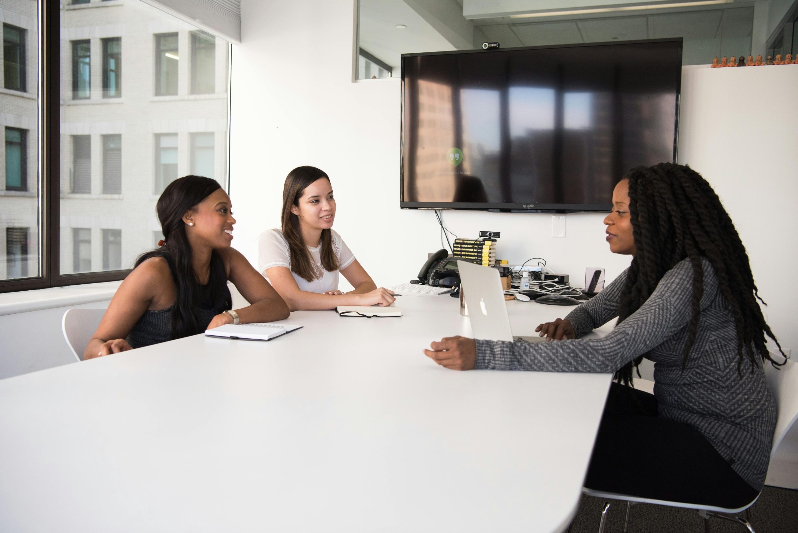 women working efficiently together in a meeting room